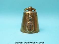 A 19th century brass novelty inkwell formed as a weight,