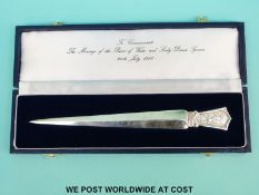 A hallmarked silver Prince of Wales and Diana marriage paper knife in case,