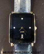 Rado Jubile ladies wristwatch set with four diamonds to the face, case size 22x27.