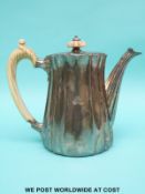 A Victorian hallmarked silver teapot of tapering and fluted form with ivory handle and finial,