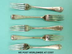 A set of five George V hallmarked silver Old English pattern dinner forks,