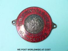 An Art Deco enamel dashboard St Christopher for Stretton's Garage, Gloucester, Phone No. 2238.