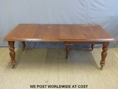 A 19thC mahogany extending dining table and two leaves,