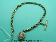 A 9ct gold Albert made up of unusual shaped links with textured surface and a Victorian locket with