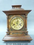 A German Wurttemburg mantel/shelf clock in wooden case with turned decoration and inset brass