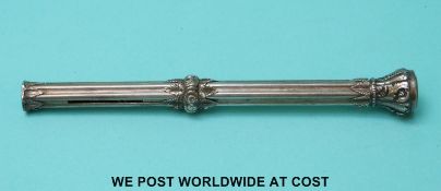 A white metal propelling pencil with acanthus leaf decoration and hardstone to top