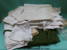 A box containing sheets, table linen, lace etc.