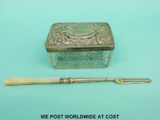 A hallmarked silver lidded cut glass dressing table pot, length 9.