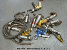 A box of various air tools