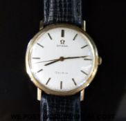 Omega 9ct gold gentleman's wristwatch with two-tone hands and baton numerals,