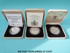 Three commemorative silver proof crowns to include a 1985 Falklands Mount Pleasant airport example
