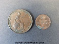 An 1844 Victorian halfpenny together with an 1844 half farthing