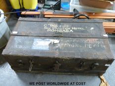 An ash and metal bound trunk with Union Castle stickers, stencilled 'G.