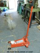 A Clarke 3 ton trolley jack with quick lift pedal