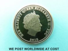 A 2015 Queen Elizabeth II £1 gold proof coin in a limited edition of 995 with certificate of