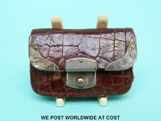 A Victorian alligator skin purse with hallmarked silver mounts, London 1896,