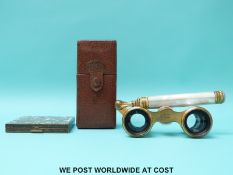 A pair of mother of pearl Paris opera glasses,