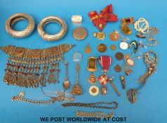 Two large Eastern bangles, large Eastern necklaces, coins, medallions, white metal brooch,