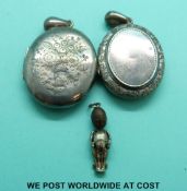 Two Victorian silver lockets and a Fumsup charm