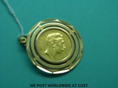 An 18ct gold pendant set with a 1896 20 mark gold coin (13.