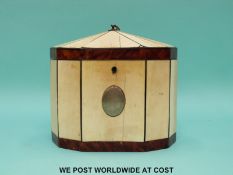 A George III ivory and blonde tortoiseshell two-division tea caddy with vacant silver cartouche,