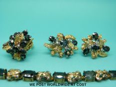 An 18ct gold suite of bespoke jewellery comprising bracelet,
