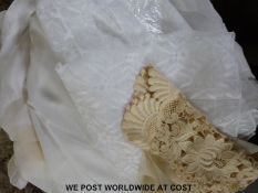 Two boxes of net curtains and similar material