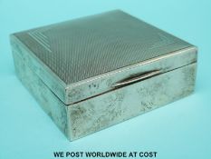 A hallmarked silver Art Deco engine-turned cigarette box, Birmingham maker Hukin & Heath Ltd,