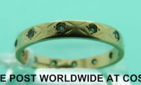 A 9ct gold eternity ring (2g,