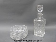 A cut glass decanter and cut glass bowl.