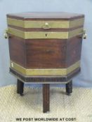A 19thC mahogany brass bound cellarette converted to a sewing box raised on splayed legs with brass
