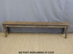 An 18th/19thC elm and oak tavern or pub bench with metal supports (L212 x H49cm)