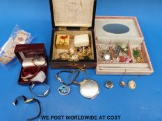 A collection of jewellery to include brooches, beads, watches, butterfly wing brooch,