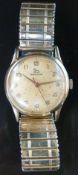 Record 9ct gold gentleman's wristwatch with gold hands and Arabic numerals,