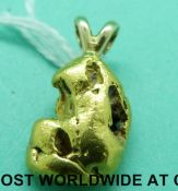 A gold nugget made into a pendant (14.