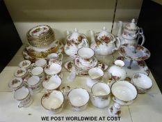 A collection of Royal Albert Old Country Roses dinner and tea ware including teapots and cake stand