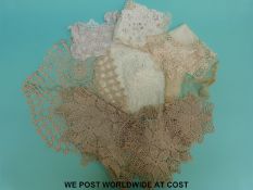 A collection of Victorian lace to include table covers/dressing table covers
