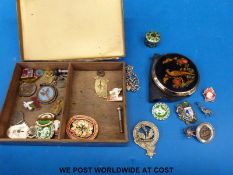 A collection of badges to include silver etc.