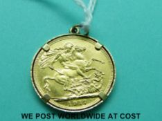 A 1917 gold full sovereign in yellow metal mount (9.