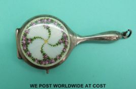 A continental silver and guilloche enamel compact in the form of a hand mirror,