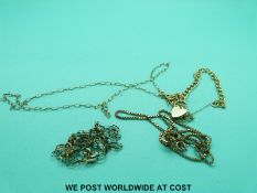 A 9ct gold bracelet with padlock clasp and two 9ct gold belcher chains (7.
