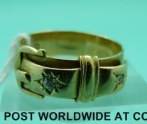 An 18ct gold buckle ring set with two diamonds, Chester 1901 (5g,