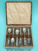 Six cased white metal spoons with filigree decoration stamped 800 (59g)