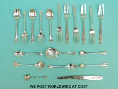 A quantity of hallmarked silver cutlery to include a set of six cake forks,