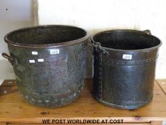 A 19thC riveted twin handled copper copper and a similar example with bucket and handle