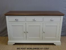 A modern dresser with fitted three drawers over three cupboards (W148 x D48 x H87cm)