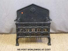 A cast iron fire grate (width 49cm)