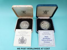 Queen Mother 80th Birthday cased silver crown, together with a 90th Birthday example,