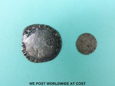 A Charles I shilling together with a holed Scottish twenty pence piece