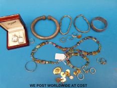 A white metal bangle marked 925, millefiori necklace, earrings, rings and christening bangle,